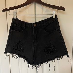 Black ripped denim shorts. Womens.